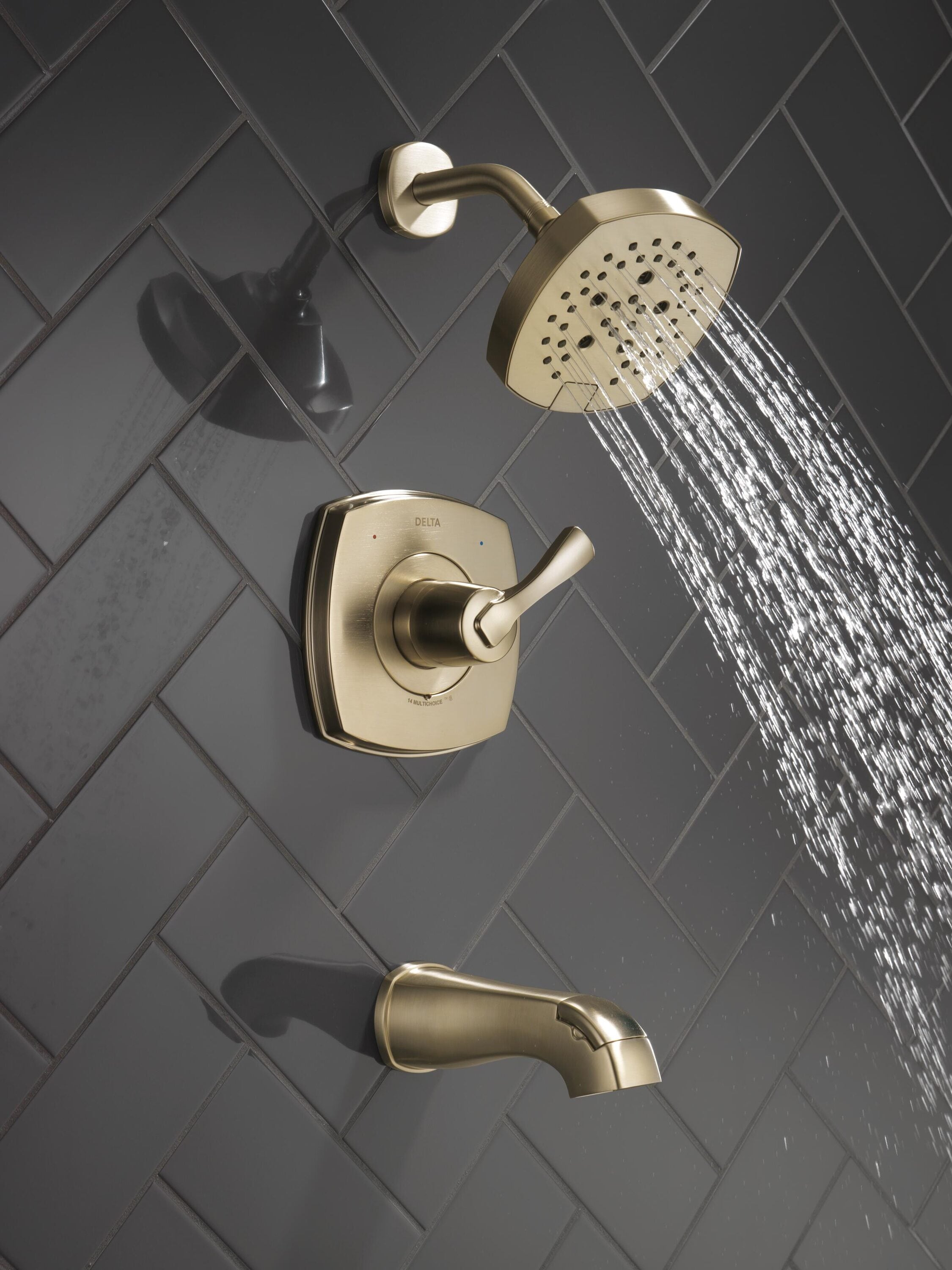 Grifo de bañera y ducha redonda de 7.0 pulgadas de una sola manija en acabado bronce champan Lumicoat Delta Stryke