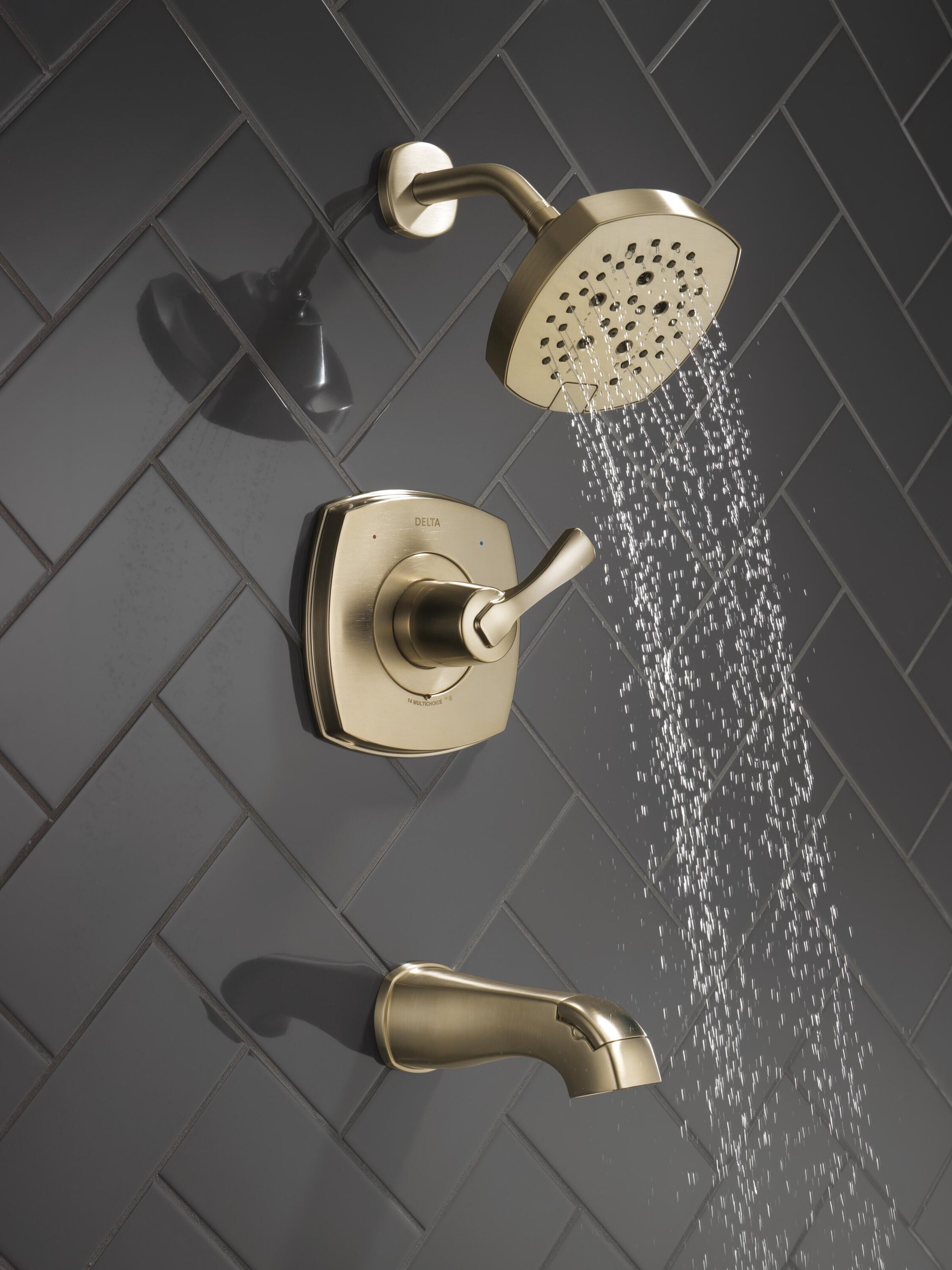 Grifo de bañera y ducha redonda de 7.0 pulgadas de una sola manija en acabado bronce champan Lumicoat Delta Stryke