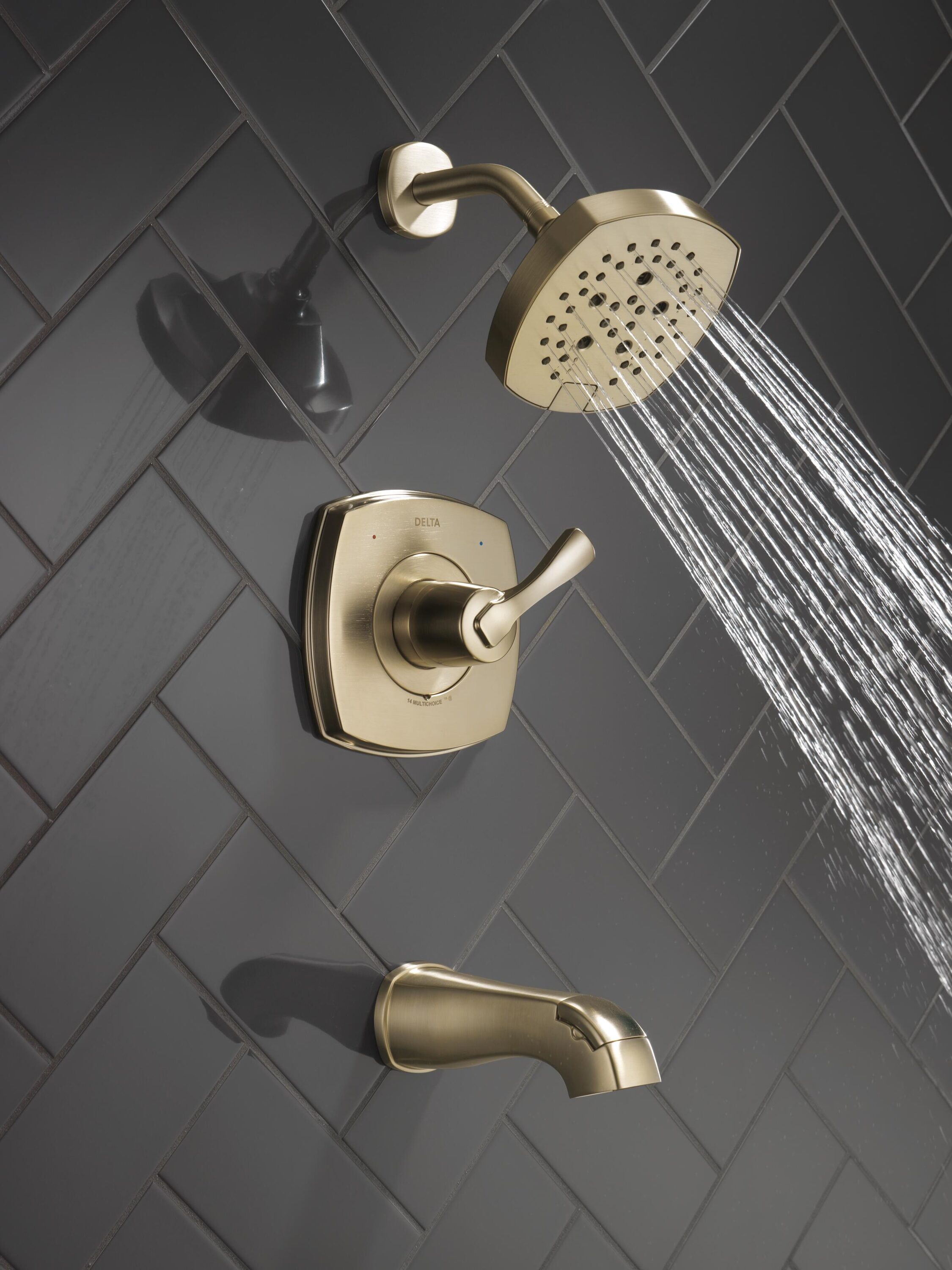 Grifo de bañera y ducha redonda de 7.0 pulgadas de una sola manija en acabado bronce champan Lumicoat Delta Stryke