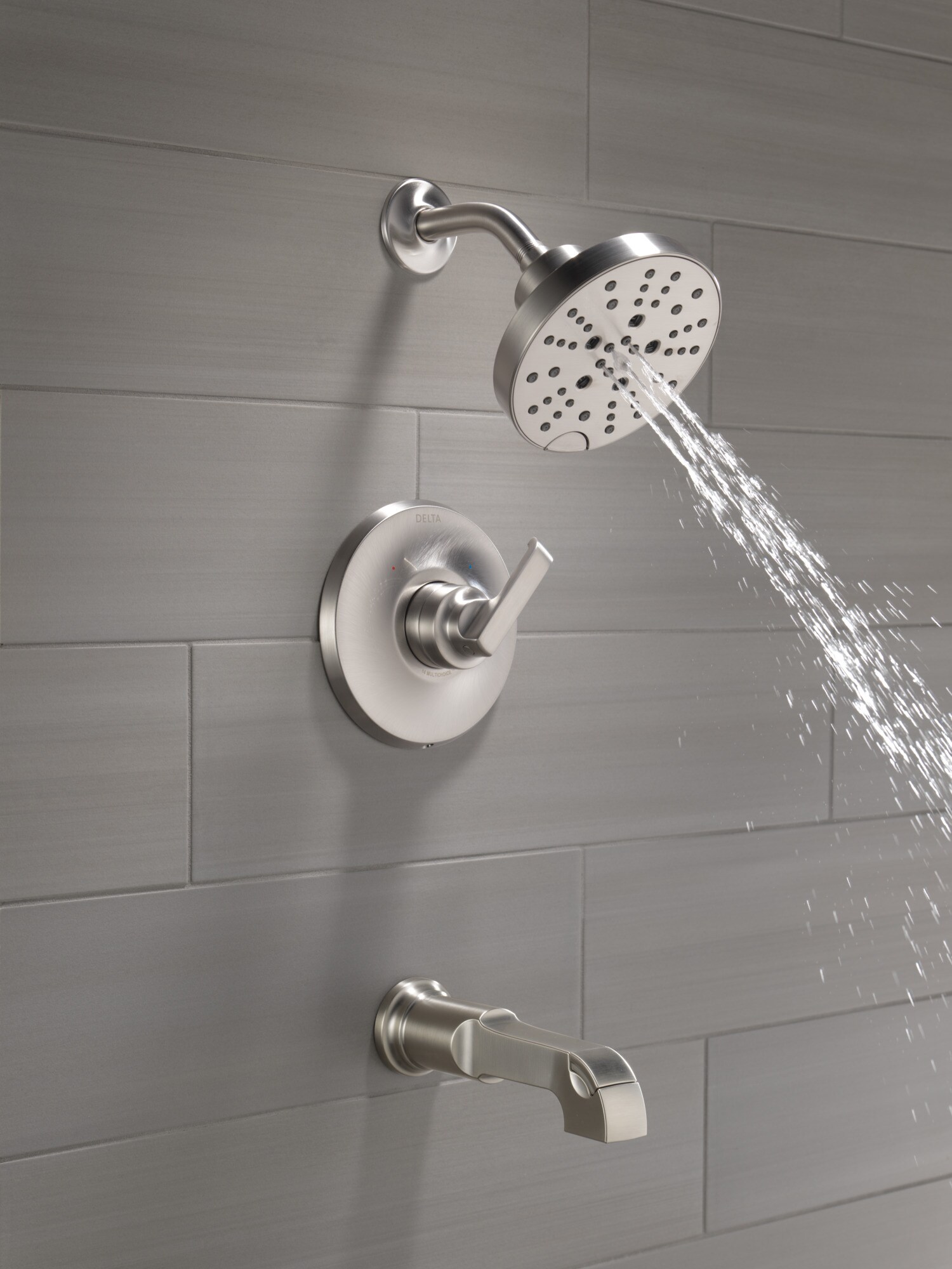 Grifo para bañera y ducha redonda de 6 pulgadas con un solo mango de acero inoxidable con recubrimiento lumínico Delta Tetra.