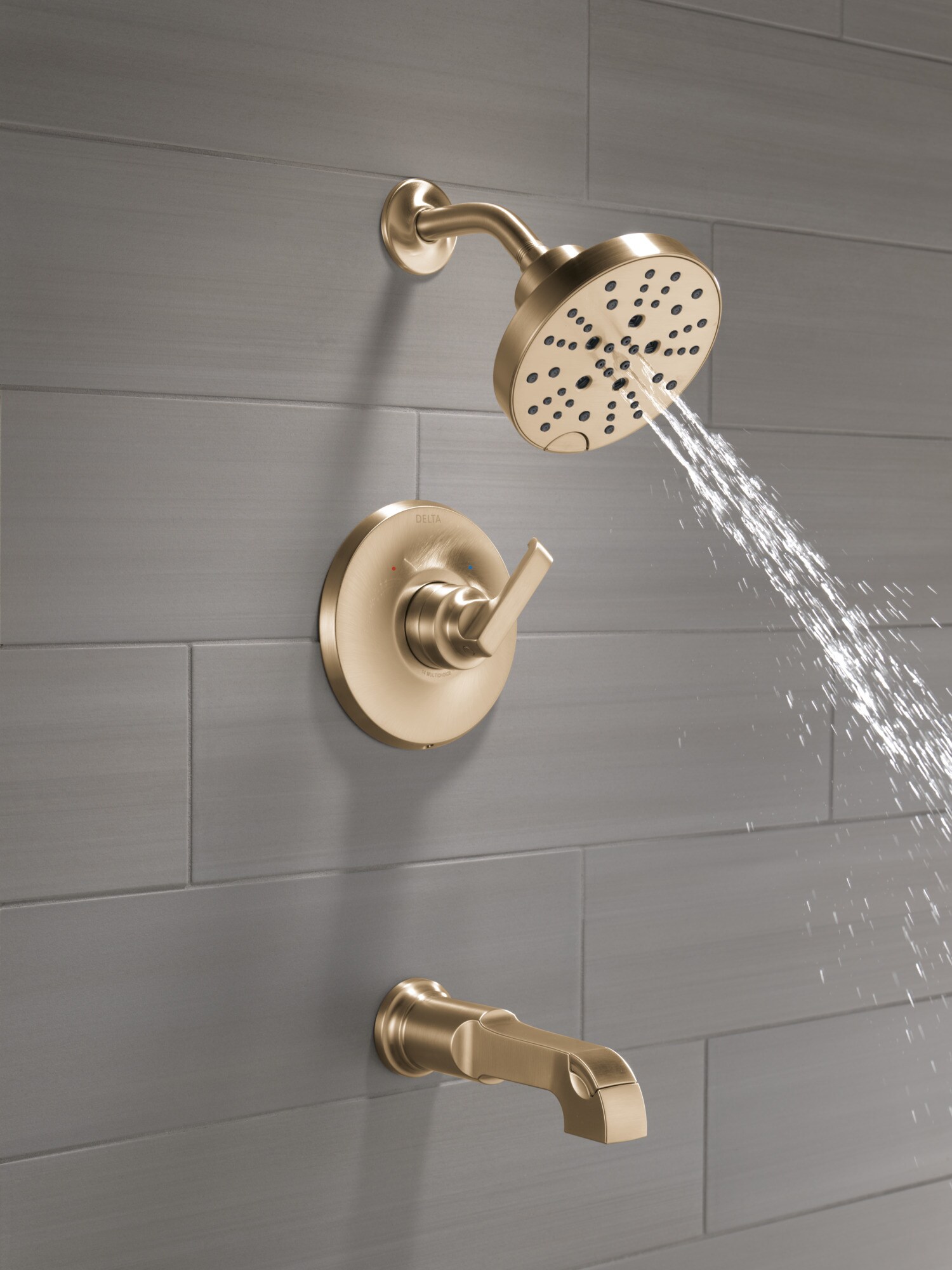 Grifo para bañera y ducha redonda multifuncional de 6 pulgadas, con un mango en tono bronce champán Delta Tetra Lumicoat