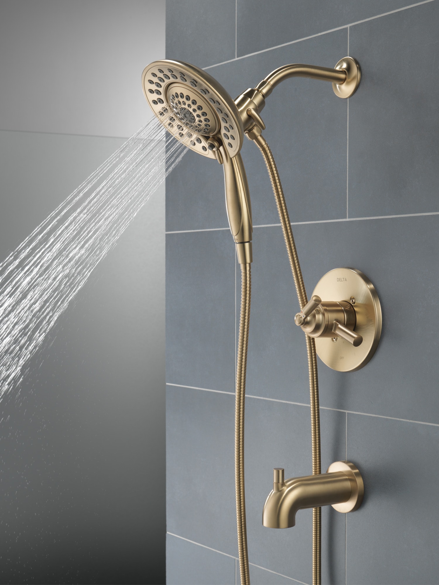 Grifo de bañera y ducha redondo de 6.81 pulgadas, multi-función, de 2 manijas en bronce champagne Delta Saylor T17435-CZ-I.