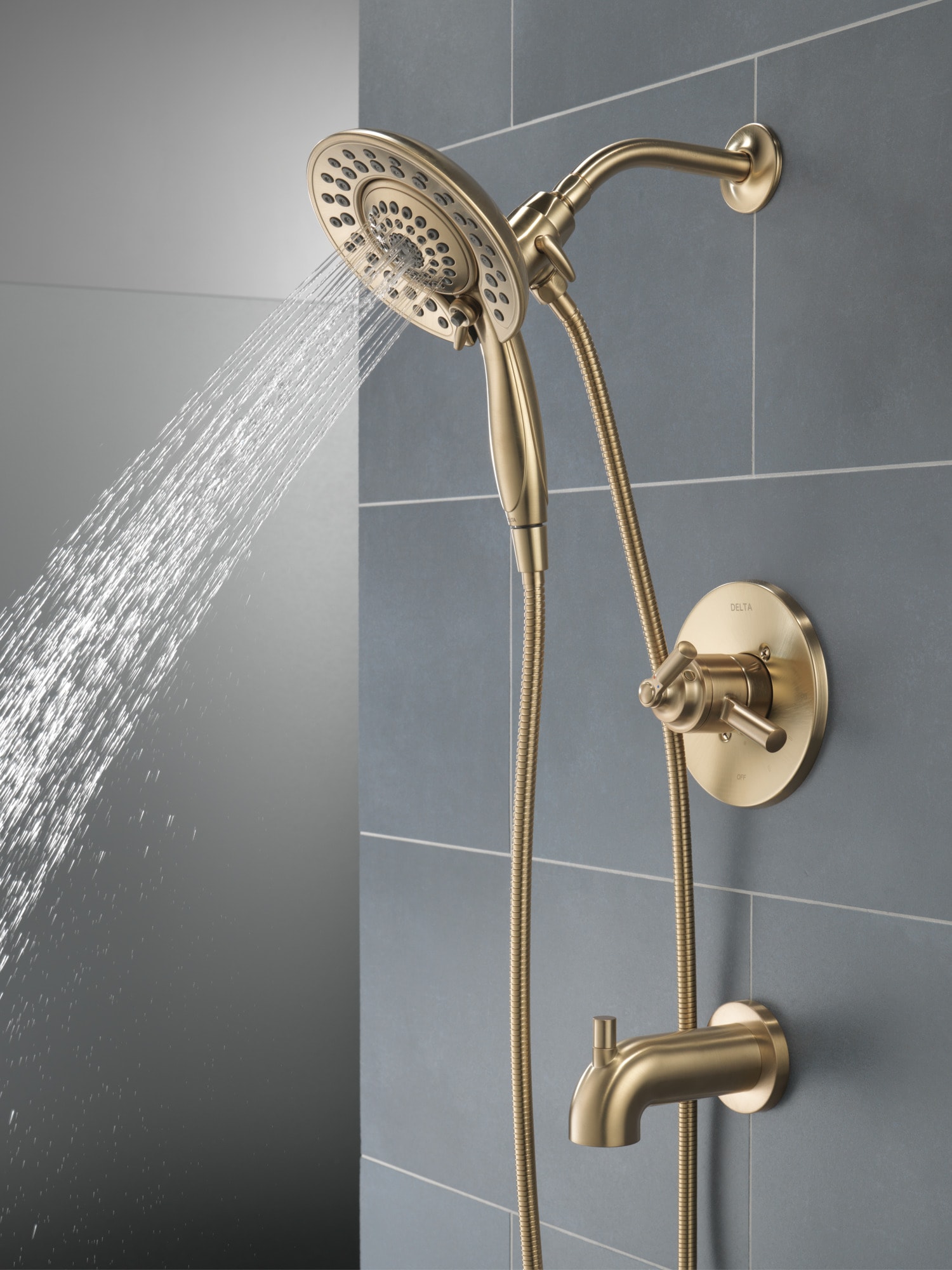 Grifo de bañera y ducha redondo de 6.81 pulgadas, multi-función, de 2 manijas en bronce champagne Delta Saylor T17435-CZ-I.
