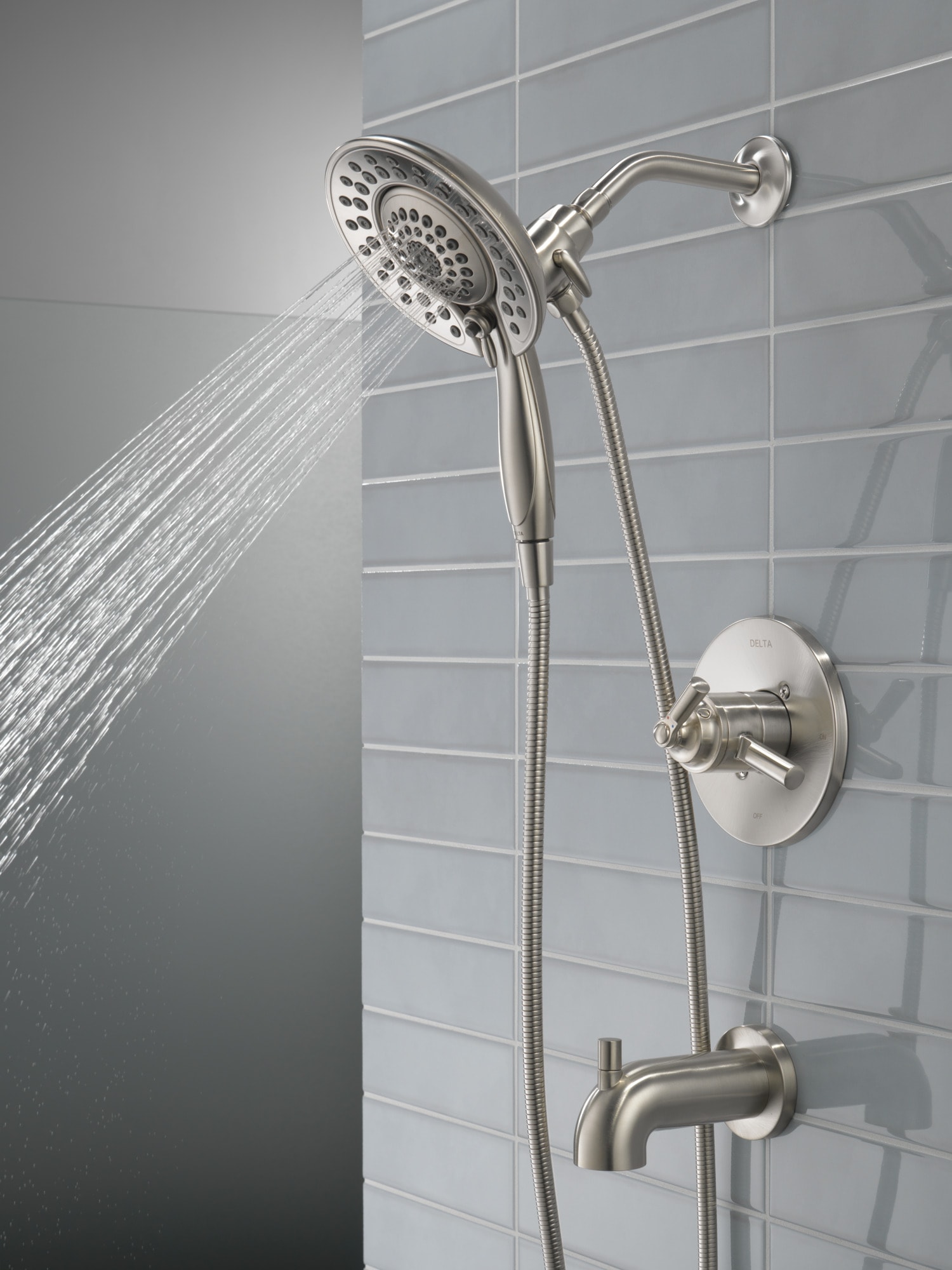 Grifo para bañera redondo de acero inoxidable Delta Saylor con 2 manijas y función múltiple de 6.81 pulgadas