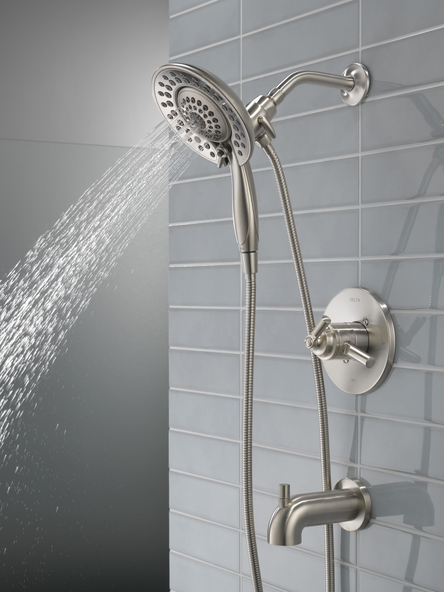 Grifo para bañera redondo de acero inoxidable Delta Saylor con 2 manijas y función múltiple de 6.81 pulgadas