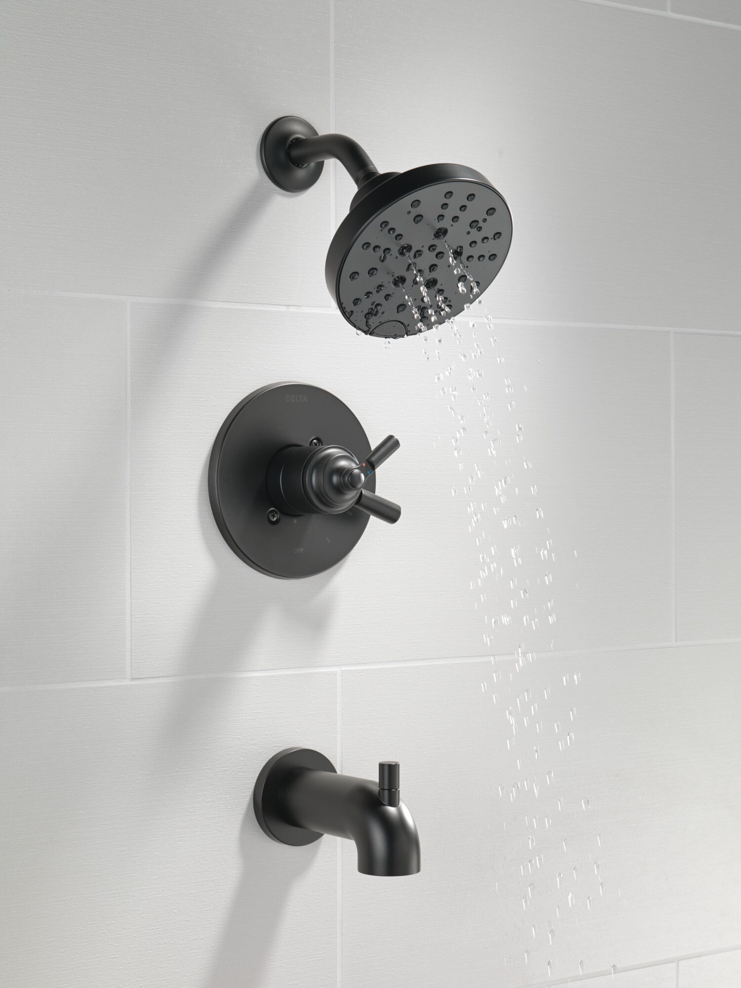 Grifo para bañera y regadera redonda de 6 pulgadas con 2 manijas en negro mate Delta Saylor