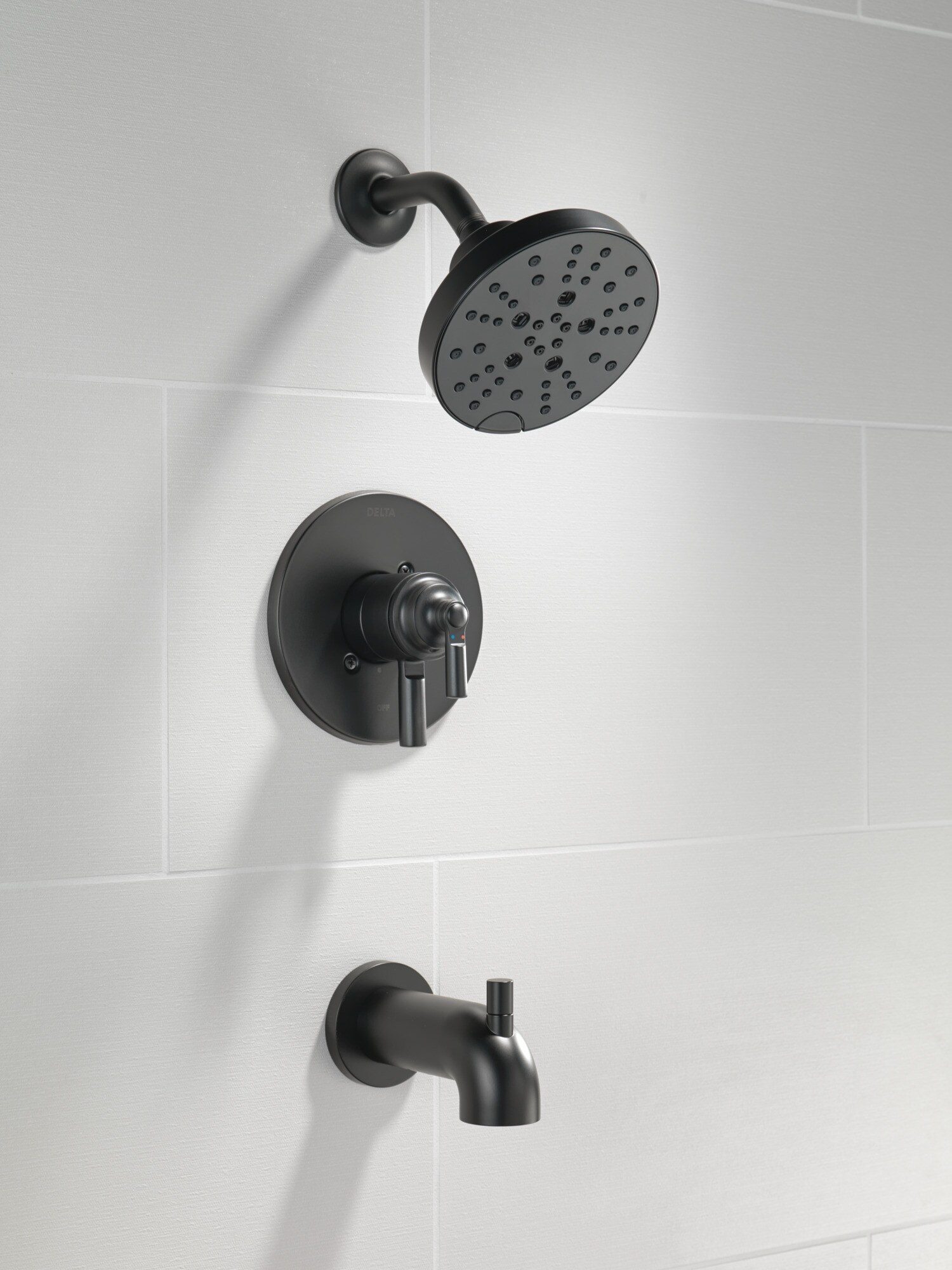 Grifo para bañera y regadera redonda de 6 pulgadas con 2 manijas en negro mate Delta Saylor