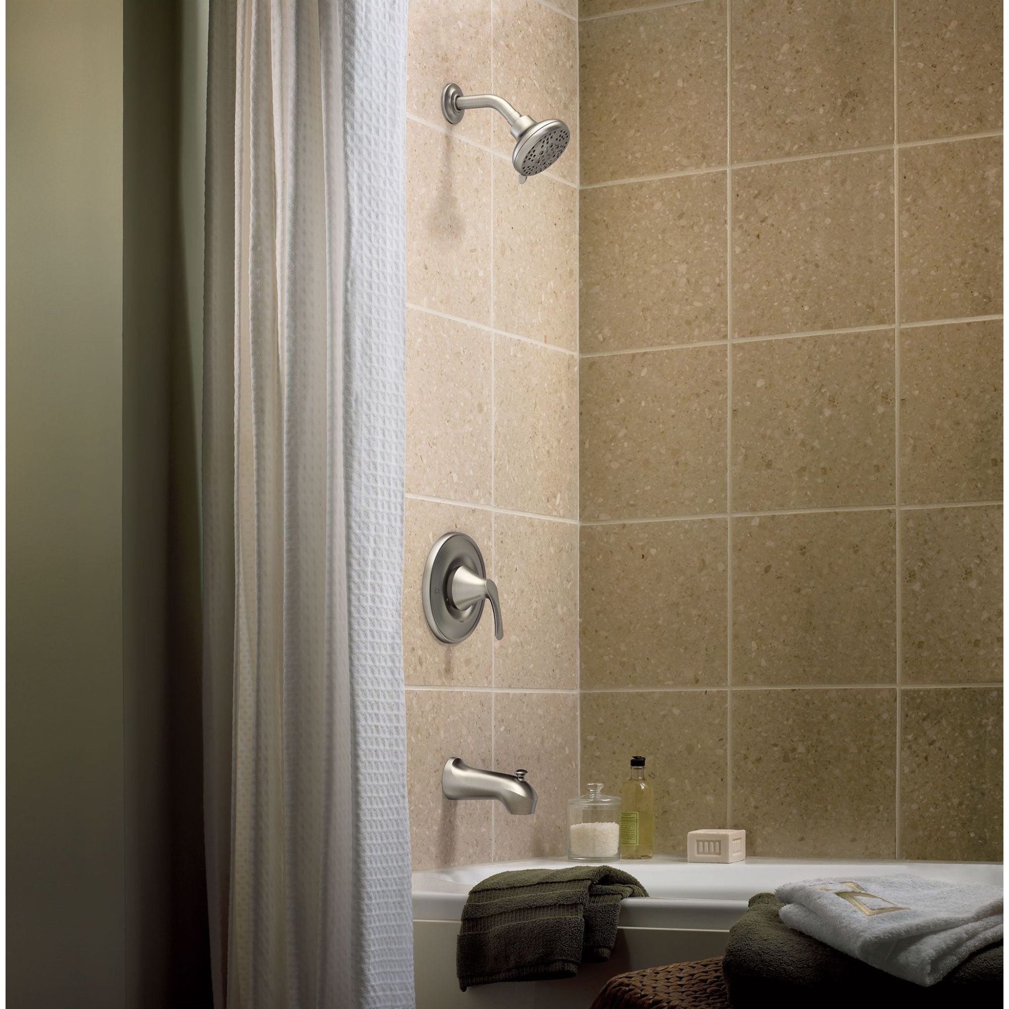 Llave mezcladora para bañera y regadera de 1 mango de níquel cepillado resistente a manchas de Moen, con función multiusos de 4 pulgadas y válvula