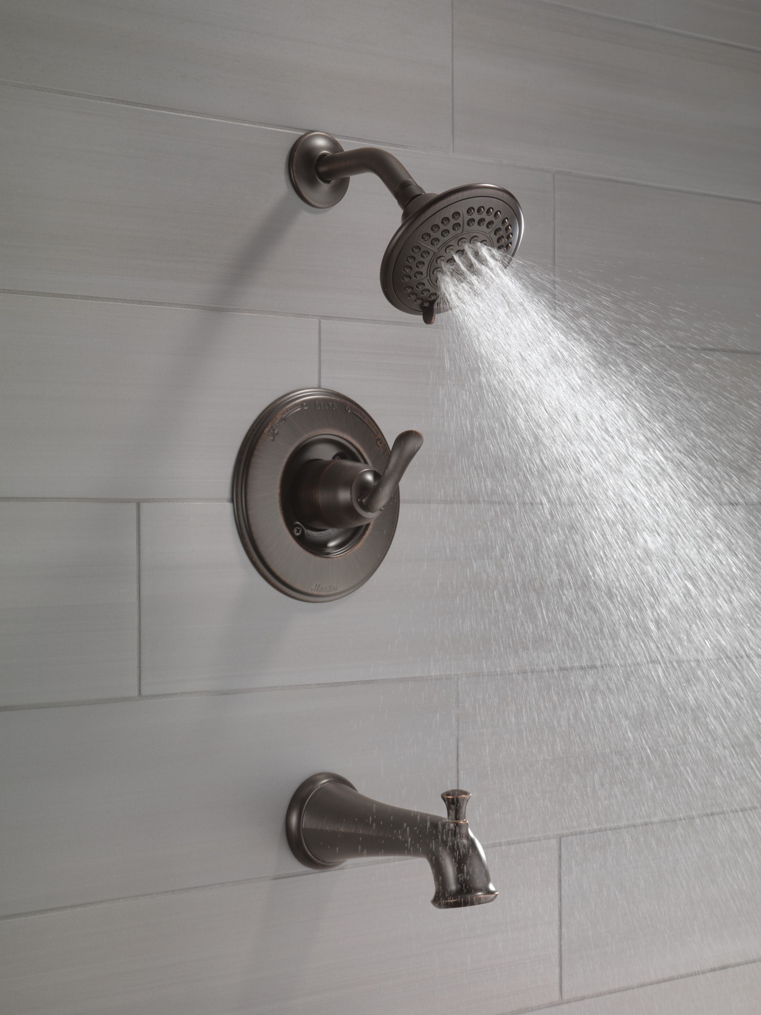 Grifo de bañera redondo de 5.125 pulgadas y ducha de función múltiple de 1 manija en bronce veneciano Delta Linden T14494-RB