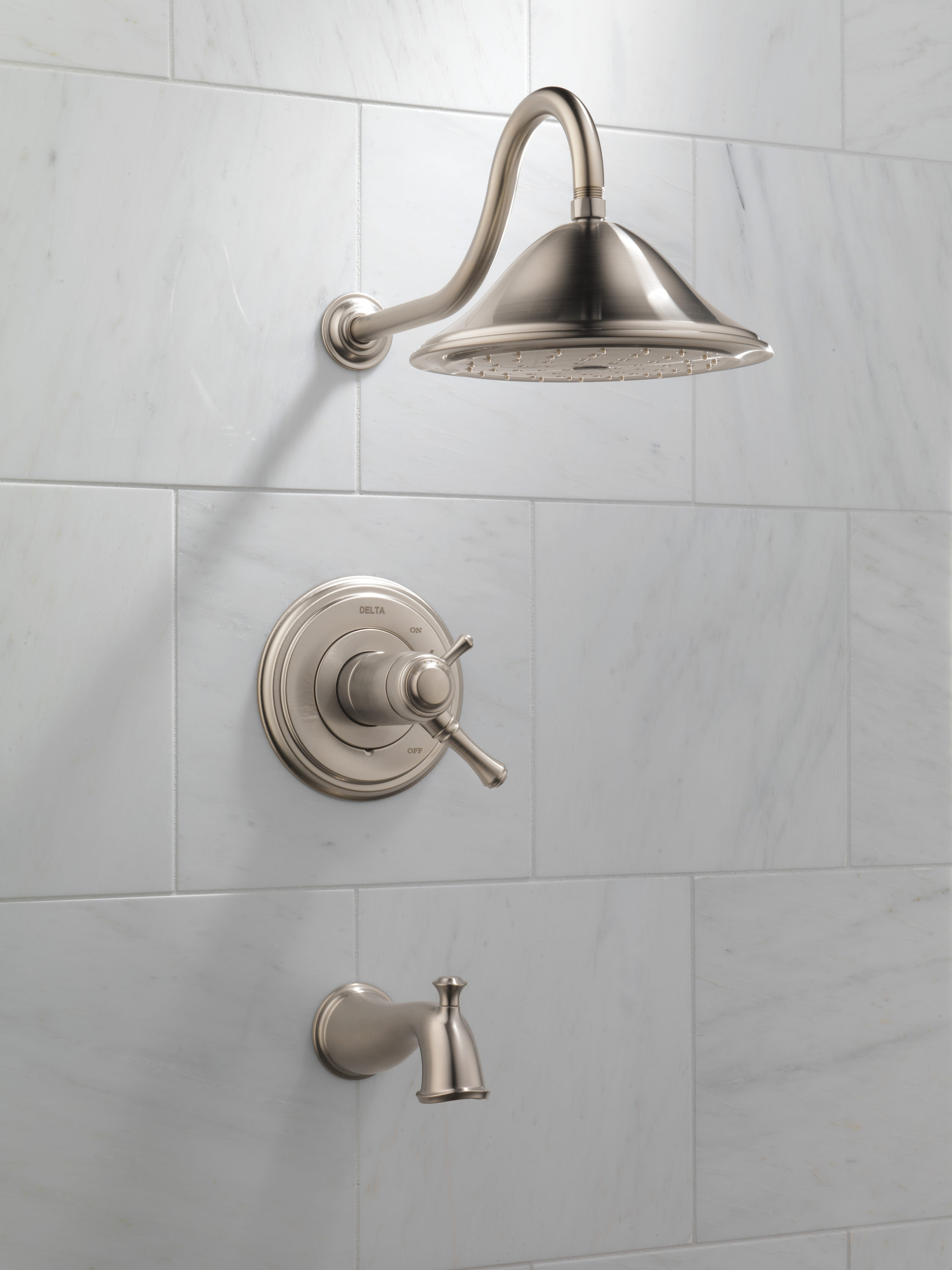 Grifo para bañera y ducha redondo de acero inoxidable con control termostático de 2 manijas y función individual, modelo Cassidy de Delta