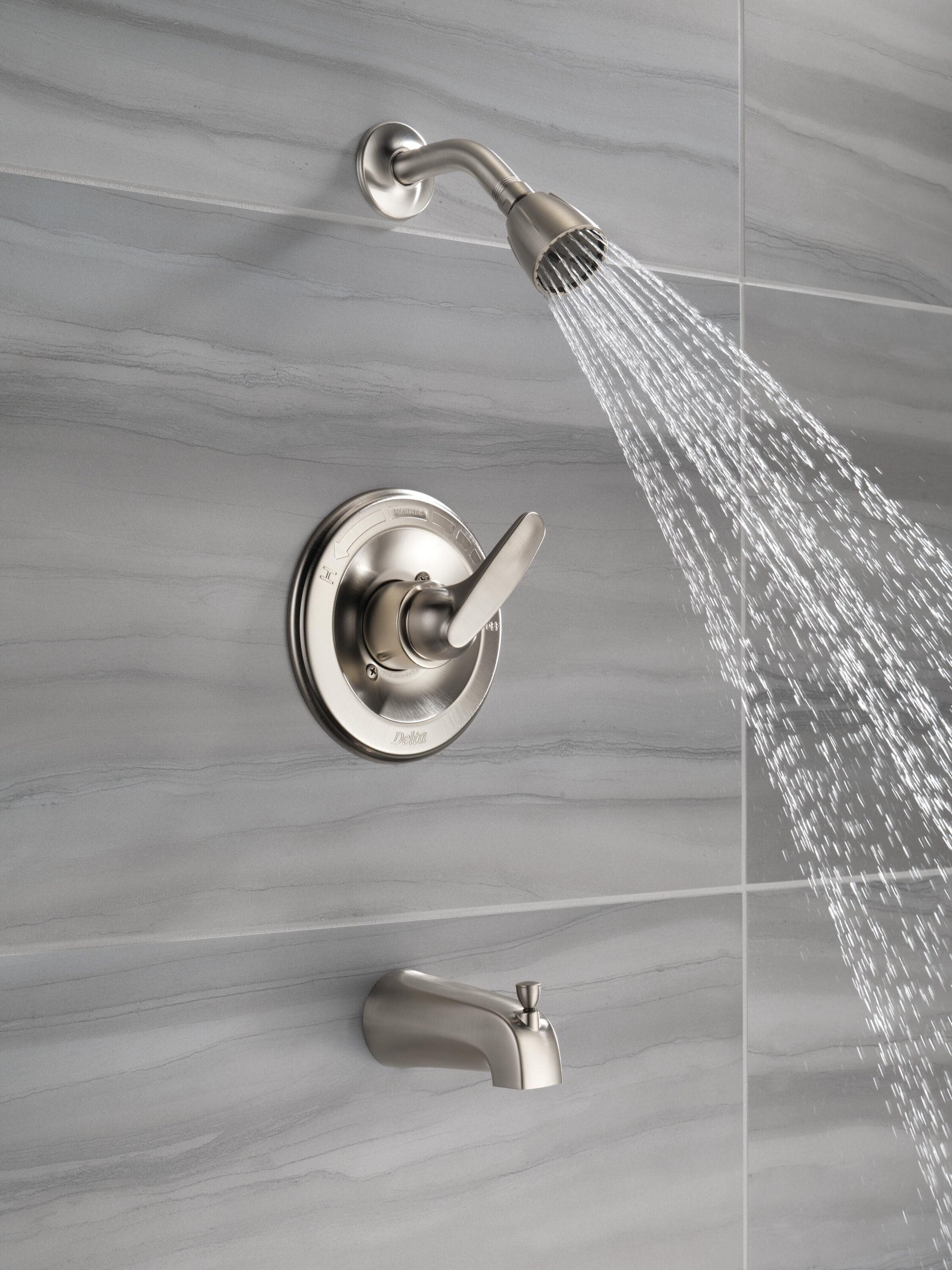 Grifo de bañera y ducha redondo de acero inoxidable de una sola función y un mango Delta Foundations BT13410-SS de 2.0 pulgadas.