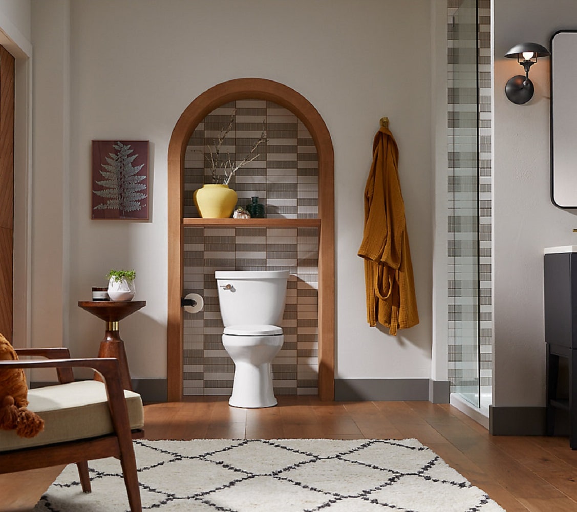 Taza de baño redonda color gris hielo de altura de silla de la marca KOHLER con descarga de 12 pulgadas modelo 31589-95.