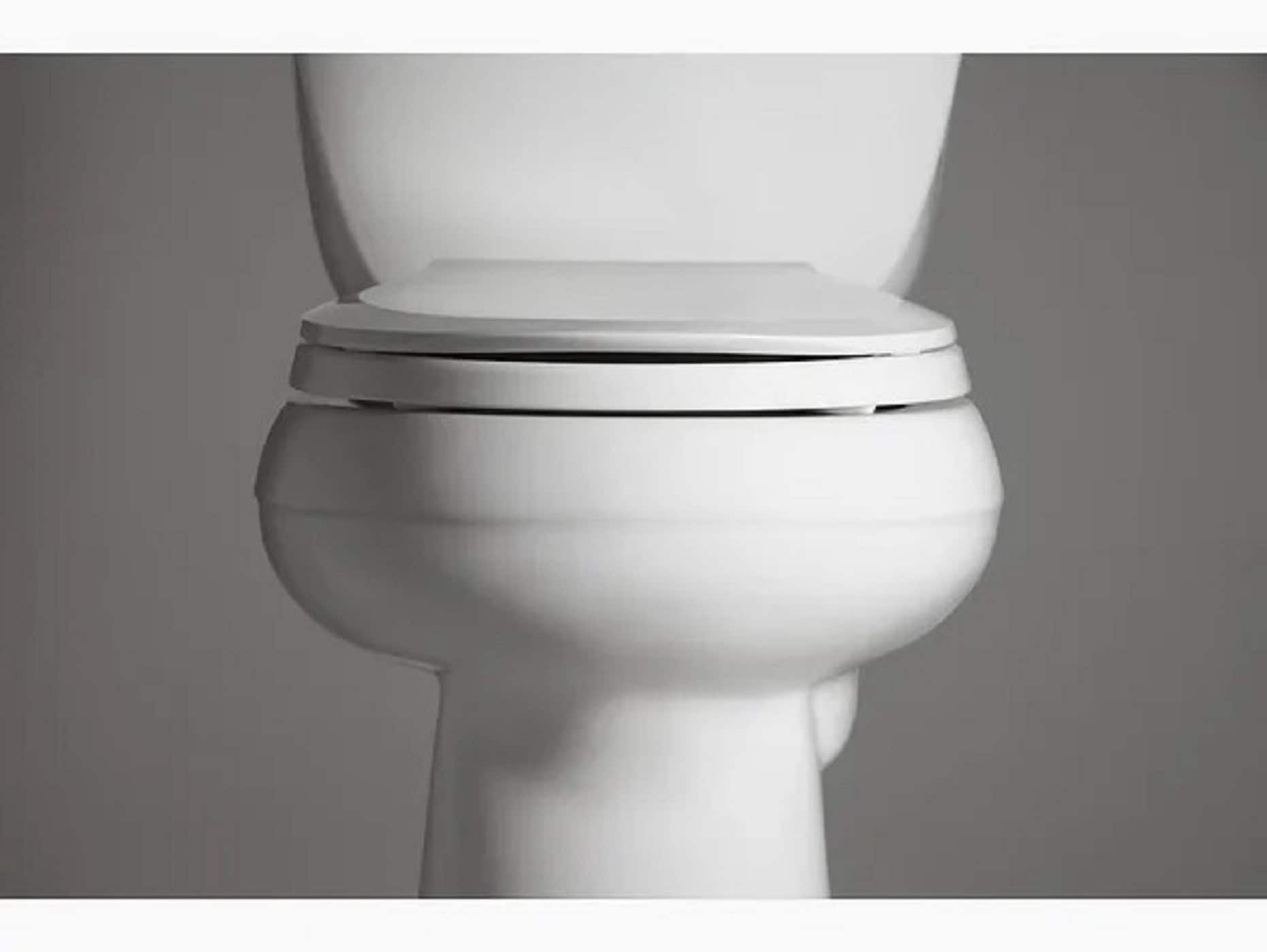 Asiento de baño redondo de plástico blanco con cierre suave - KOHLER 4639-RL-0