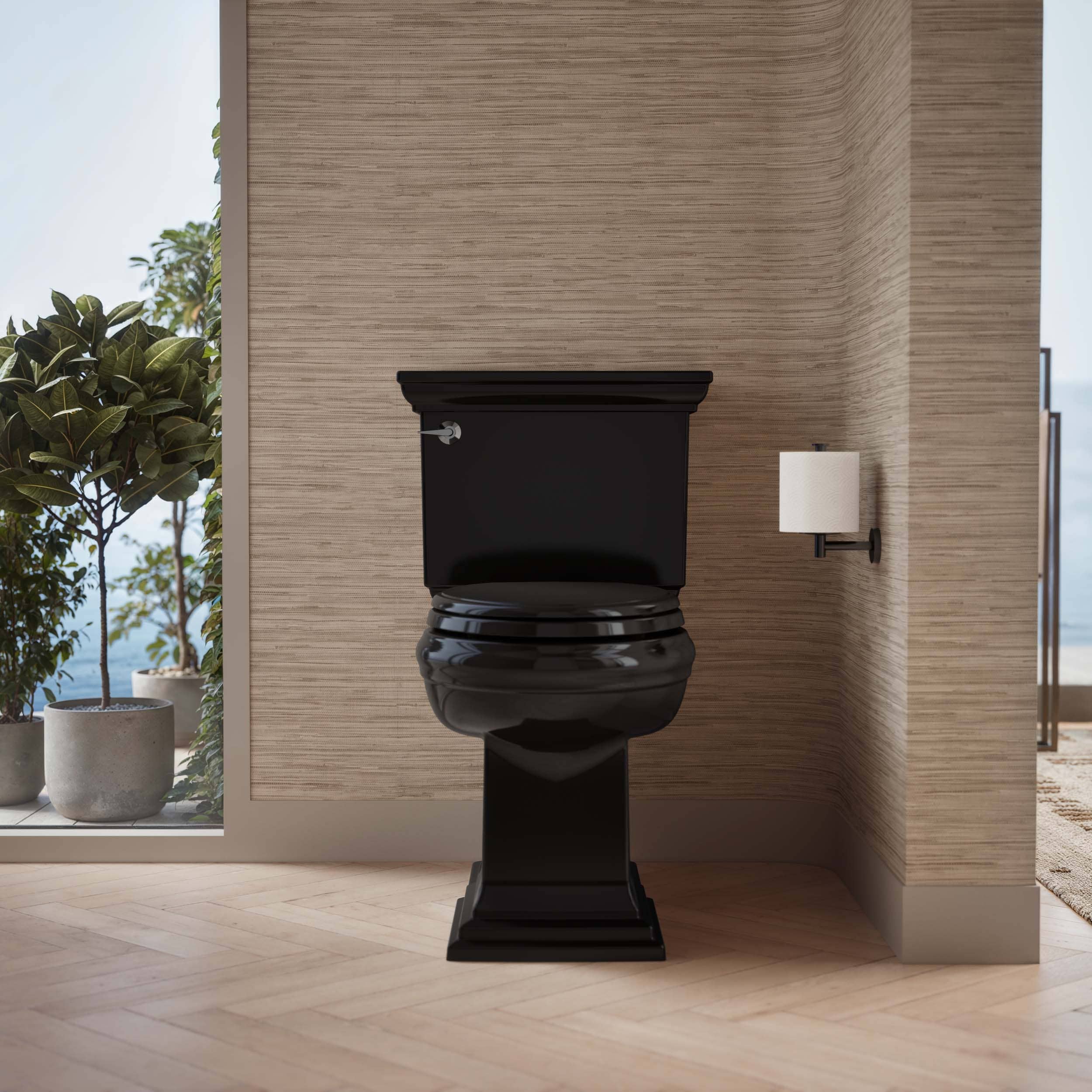 Asiento de inodoro alargado de plástico color negro con cierre suave.