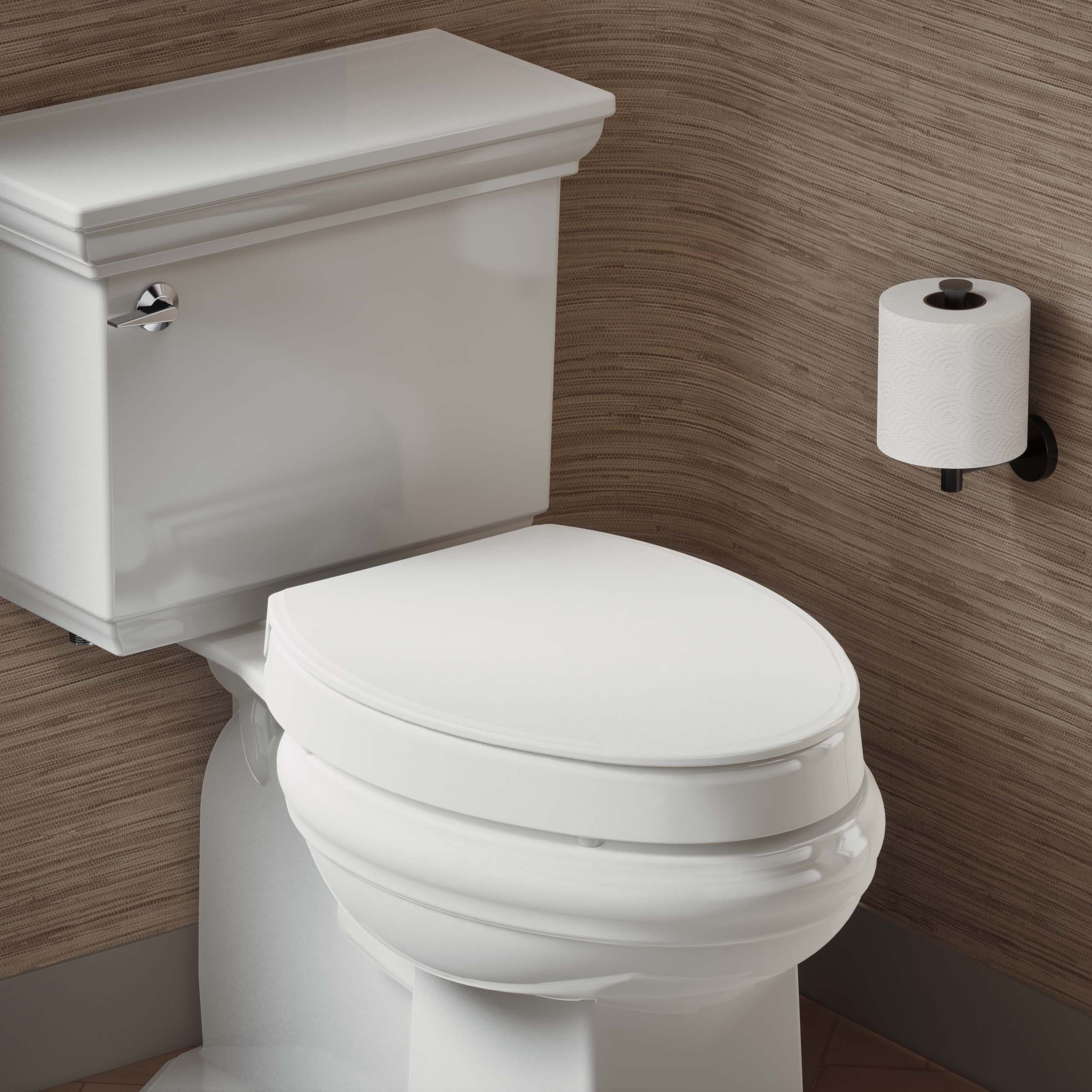 Asiento de baño KOHLER alzado de plástico blanco con tapa alargada de cierre suave