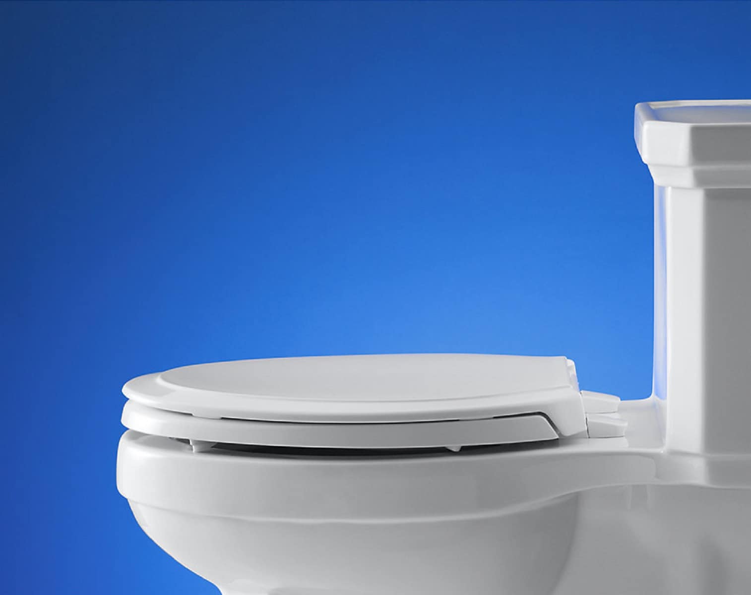 Asiento de inodoro alargado de cierre suave de plástico blanco KOHLER 4734-RL-0
