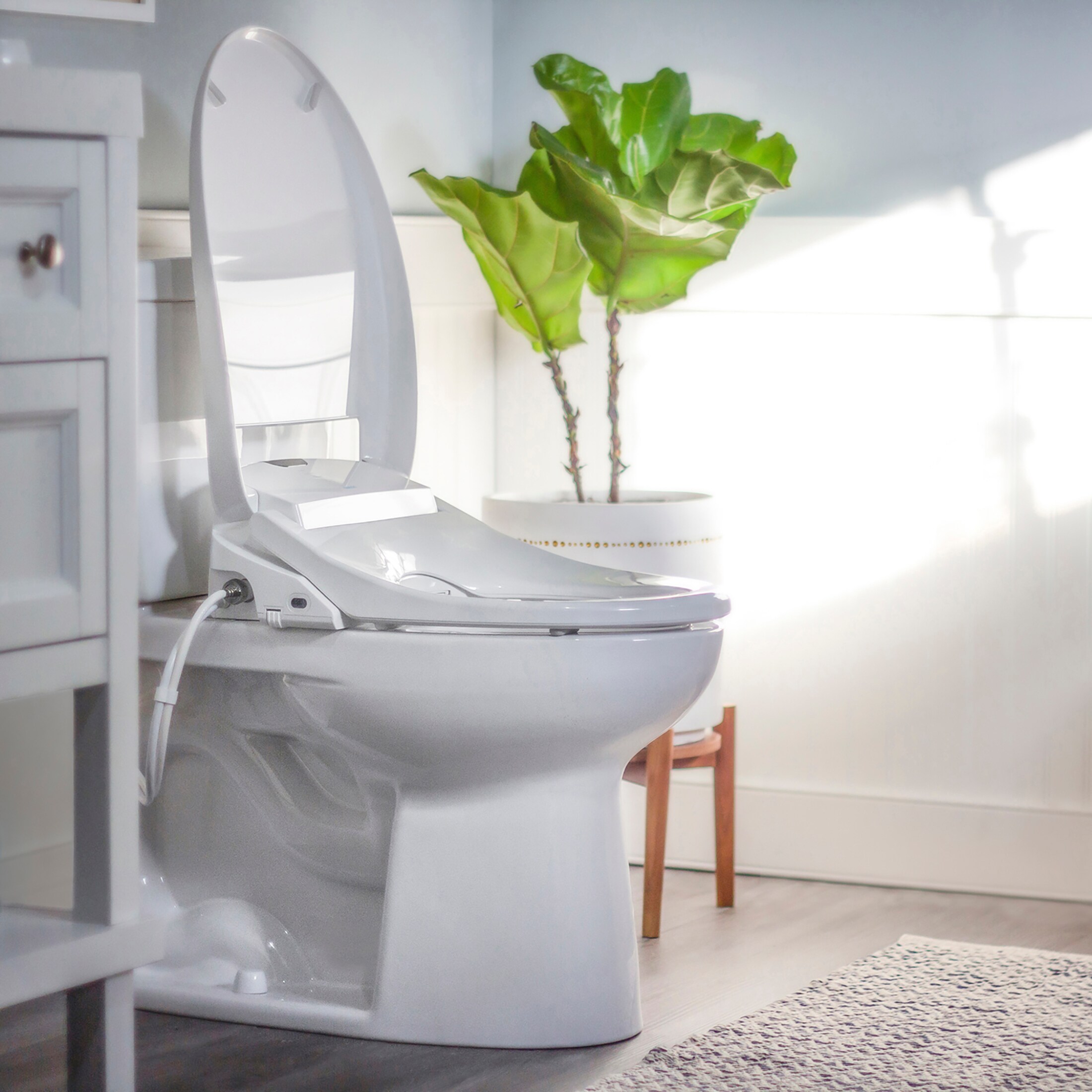 Asiento de Inodoro con Bidé Térmico Redondo de Cierre Suave en Plástico Blanco