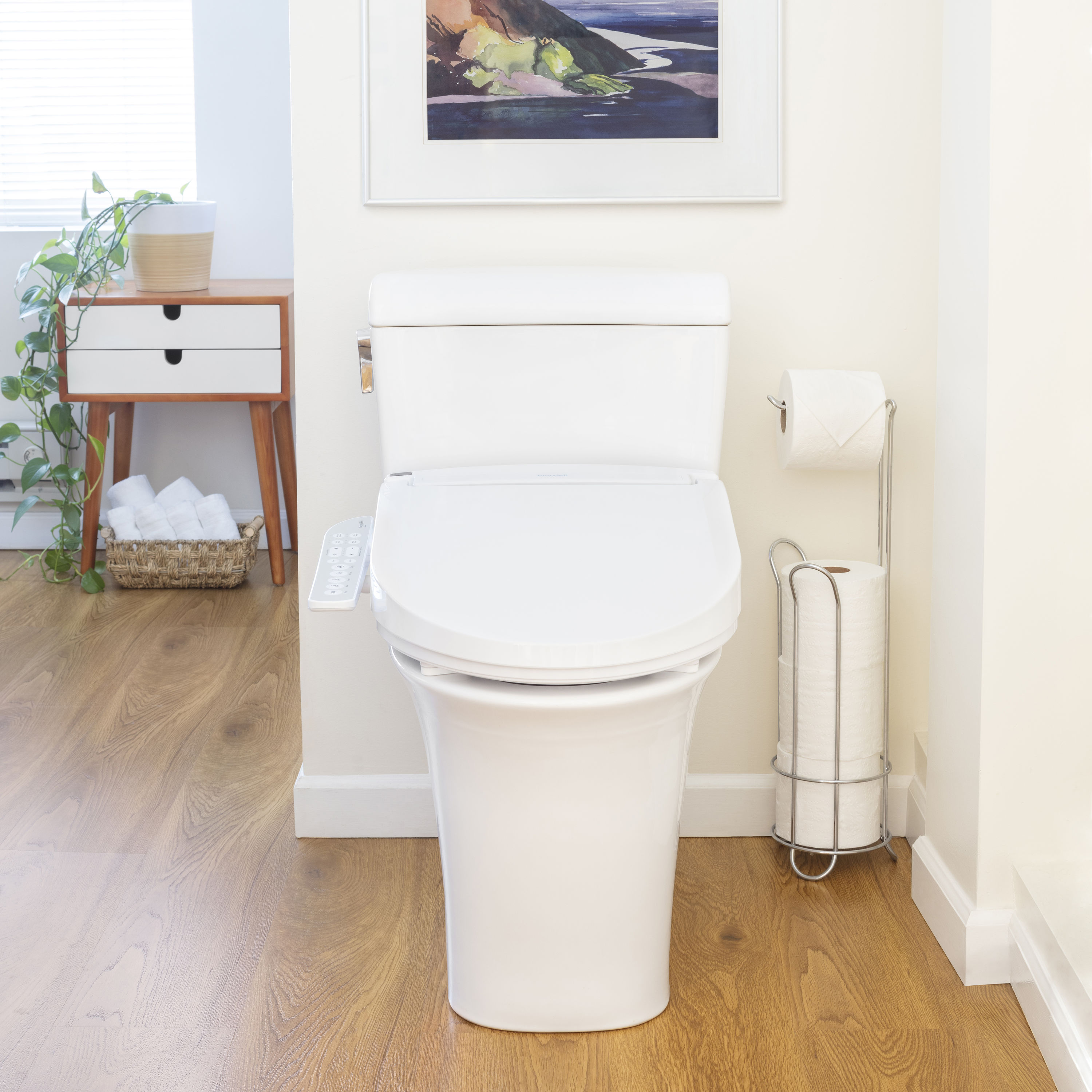 Asiento de inodoro alargado de plástico blanco con cierre suave y función de bidet con calefacción.
