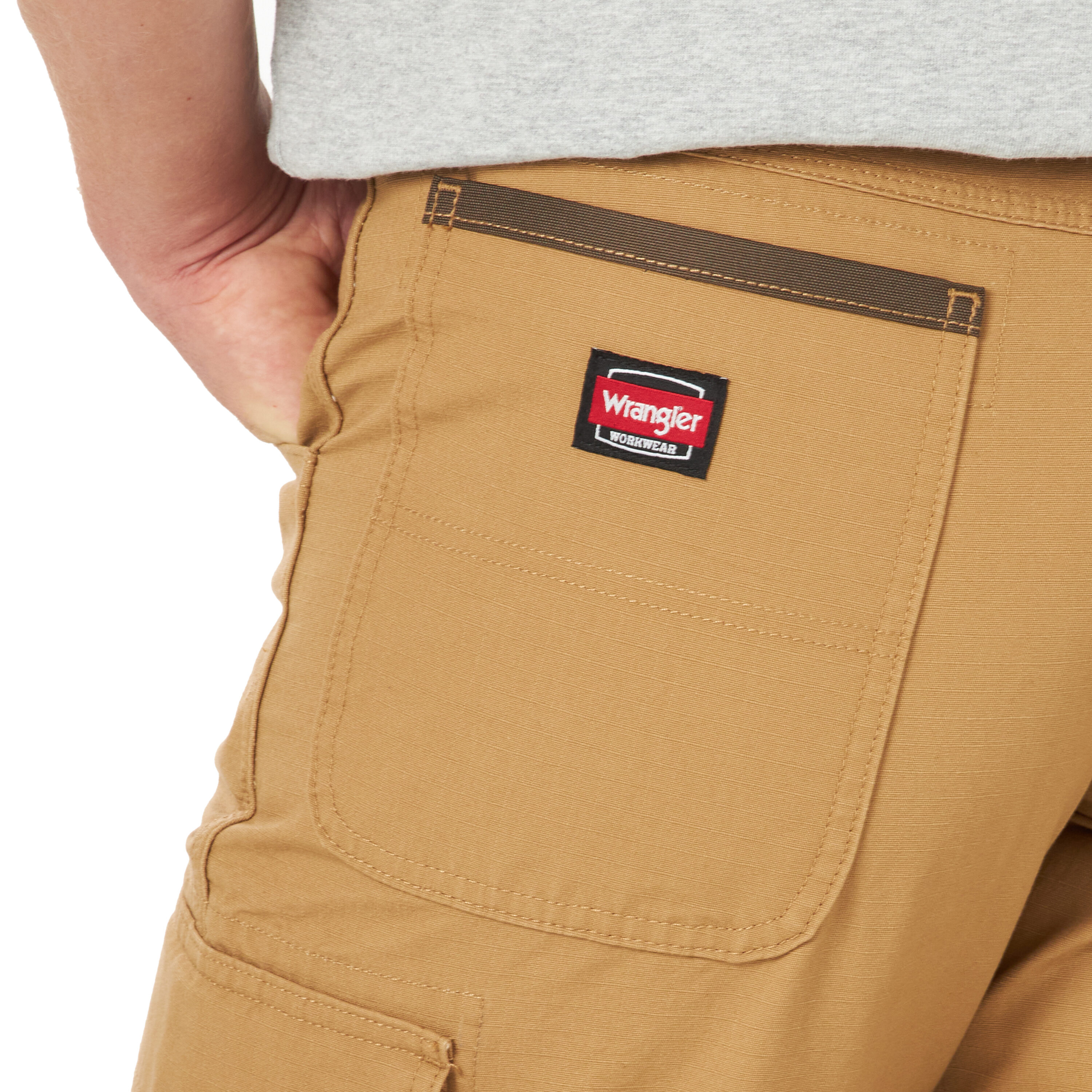 Pantalones de trabajo para hombre Wrangler en color crudo con corte holgado y estilo de carga tejida (40 x 30)