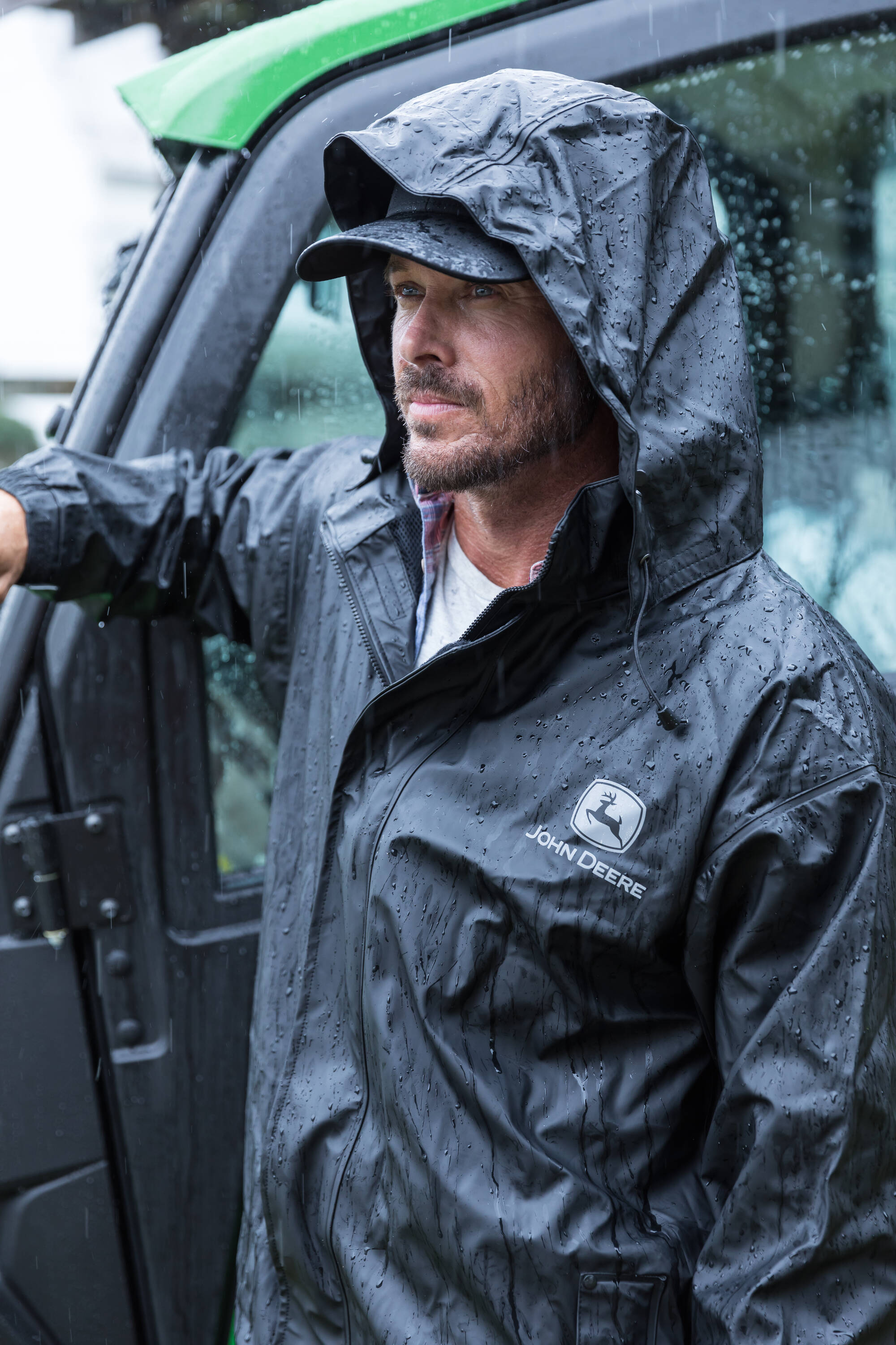 Chamarra de lluvia con capucha ligera y negra para adultos unisex de John Deere (Grande) JD44540J/L