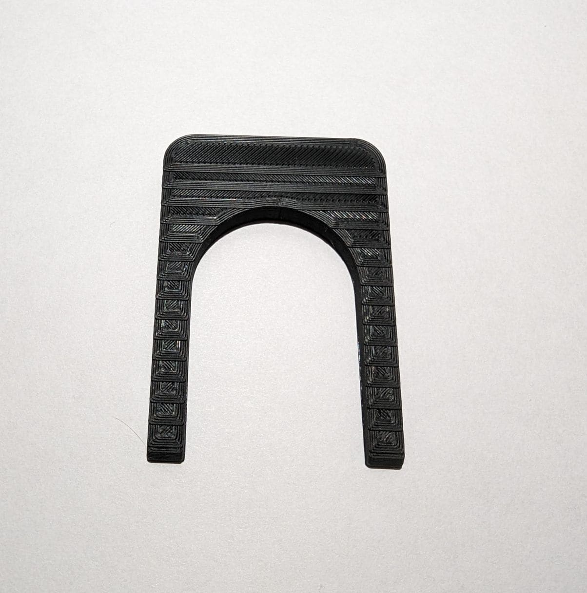 Cubiertas para perillas de horno Four Paws The Knob Stopper Tamaño Pequeño Negro TKS.SM.B05