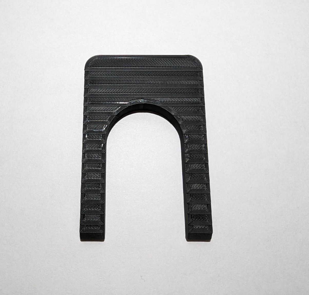 Protectores de perilla para horno Four Paws The Knob Stopper en color negro tamaño estándar TKS.STND.B05
