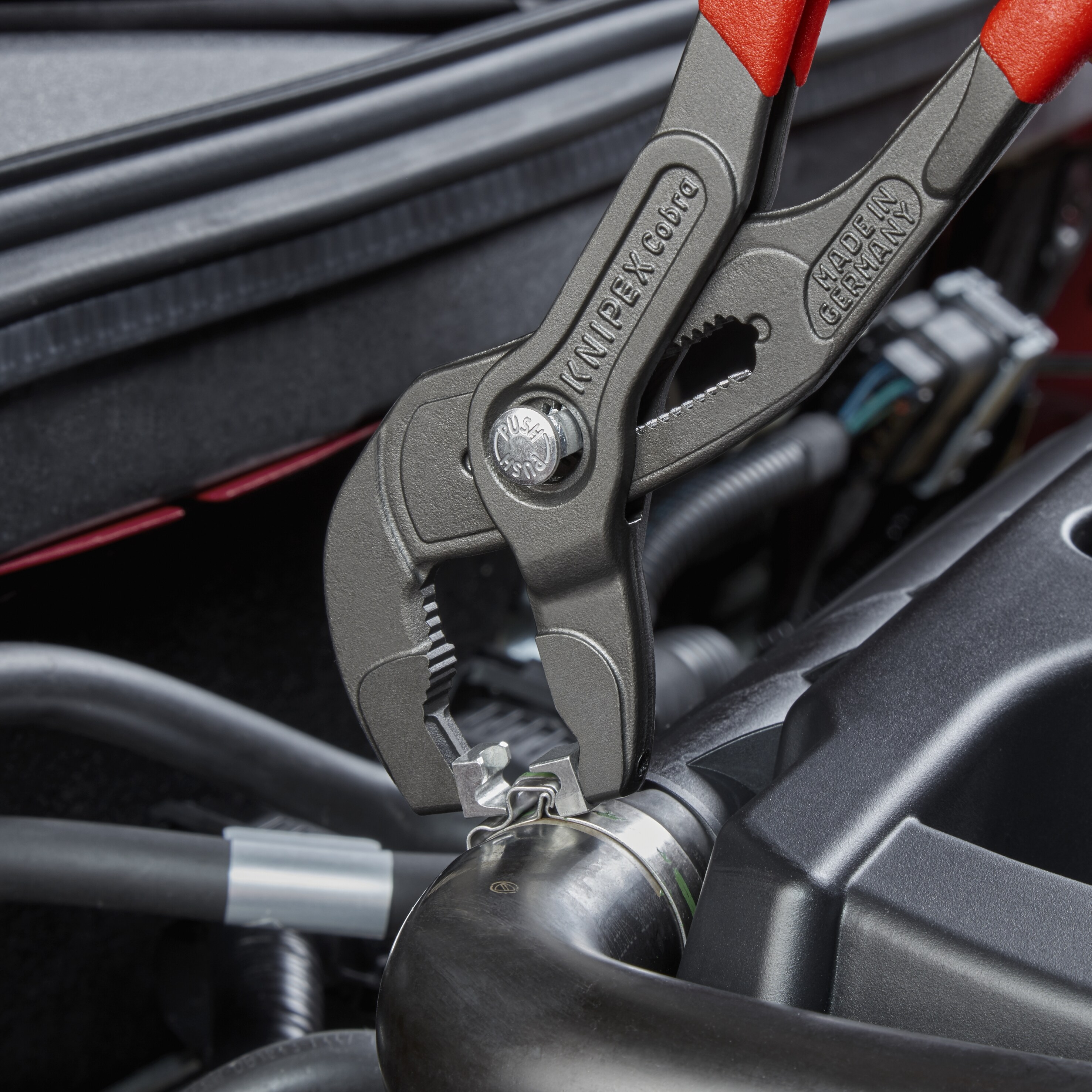 KNIPEX 9.9 pulgadas Pinzas de lengüeta y ranura para aplicaciones automotrices con puntas giratorias y mordazas con botón operado - 85 51 250 C