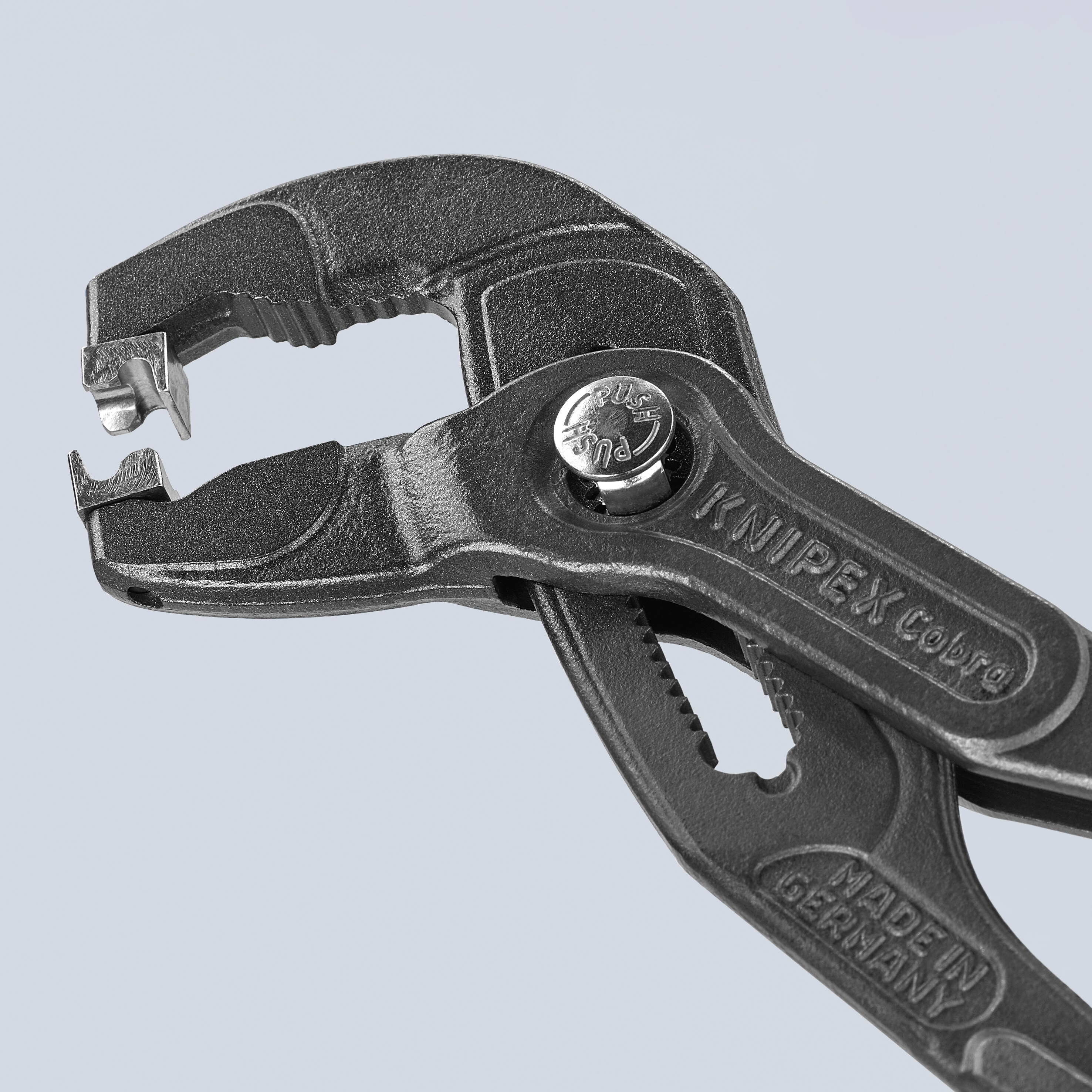 KNIPEX 9.9 pulgadas Pinzas de lengüeta y ranura para aplicaciones automotrices con puntas giratorias y mordazas con botón operado - 85 51 250 C