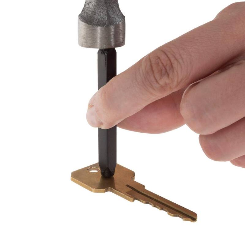Juego de 36 punzones de letras y números de acero con estuche de madera.